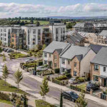 Artists impression of New houses and apartments in a large residential development in the Greater Dublin area, illustrating housing supply and construction in Ireland in 2026.