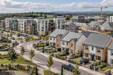 Artists impression of New houses and apartments in a large residential development in the Greater Dublin area, illustrating housing supply and construction in Ireland in 2026.